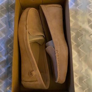 UGG Flores Loafers. Never worn/Orig box. Brass tag